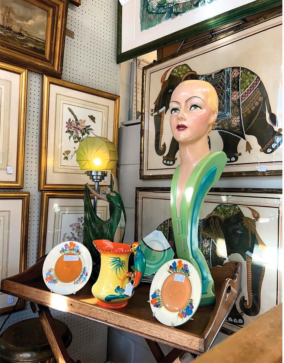A display of ceramics and Art Deco items