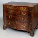 Antique mahogany serpentine commode