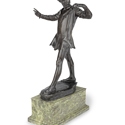 A bronze sculpture of Peter Pan