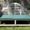 A garden bench made of teak